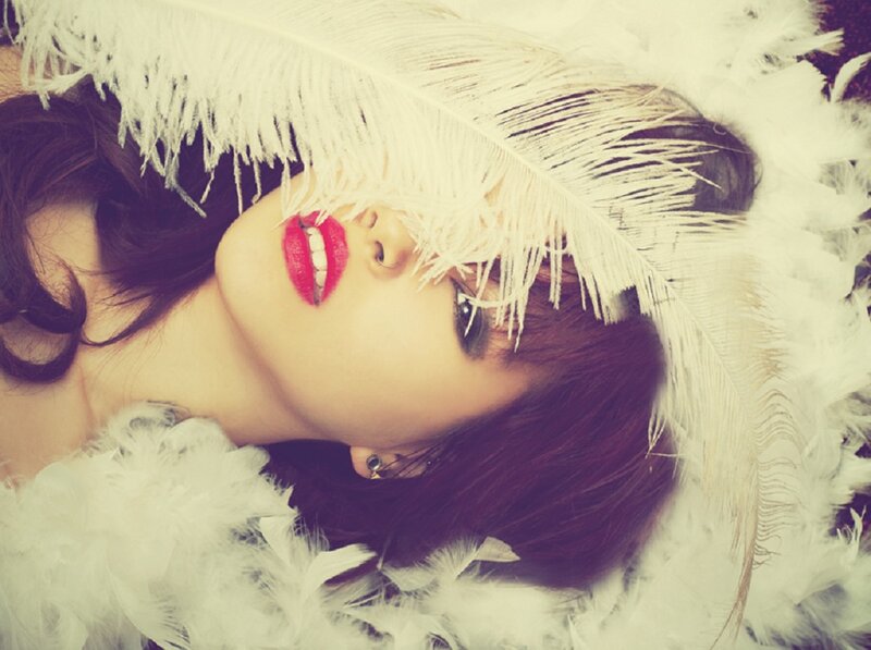 Woman with Red Lipstick — White, Dramatic, Photograph, Feathers