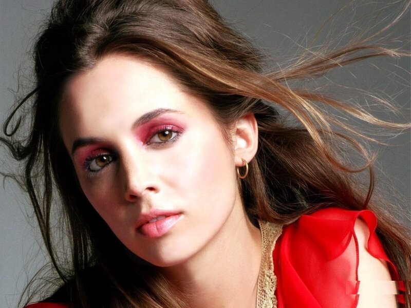 woman with red makeup and hair