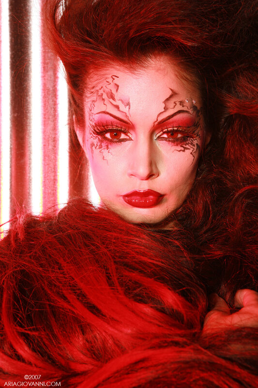 woman with red makeup and hair