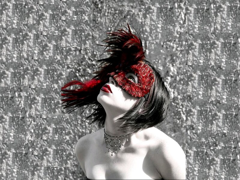 woman with red mask and feathers