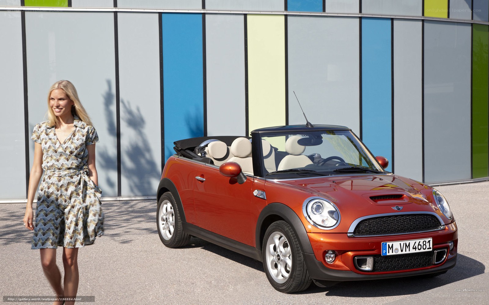 Woman with red MINI convertible