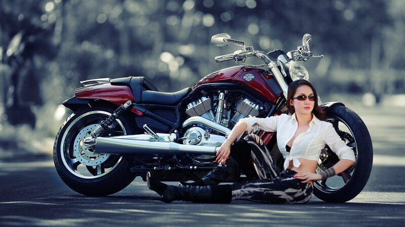 Woman with red motorcycle