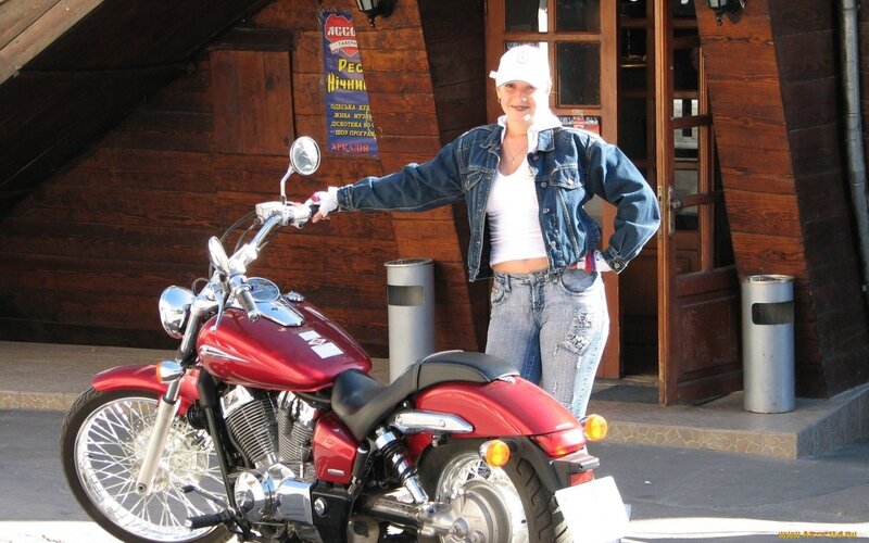 Woman with Red Motorcycle — Casual