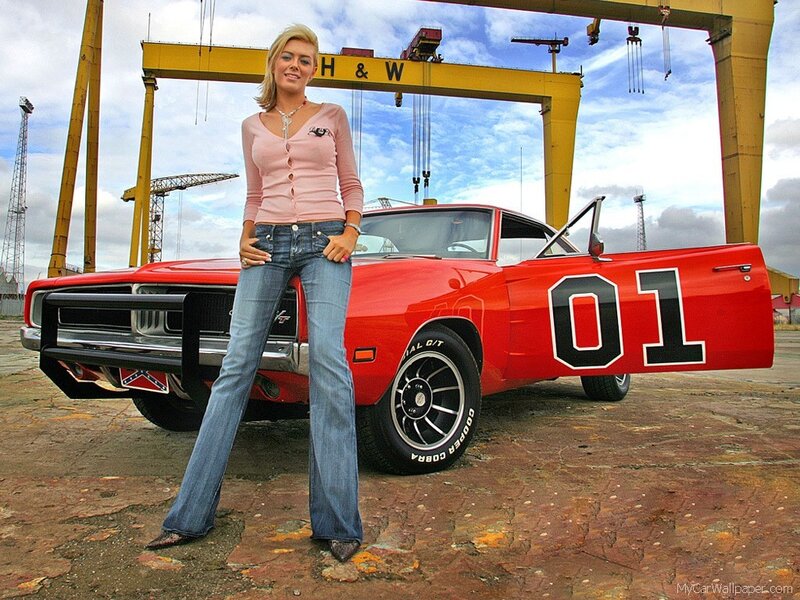 woman with red muscle car