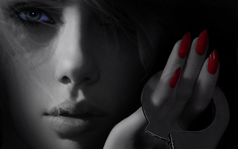 woman with red nails and handcuffs
