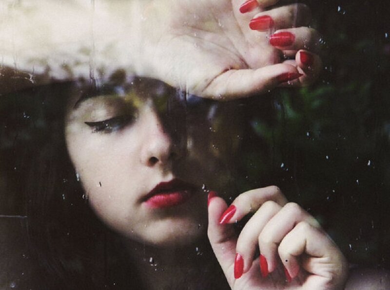 Woman with Red Nails — Melancholic