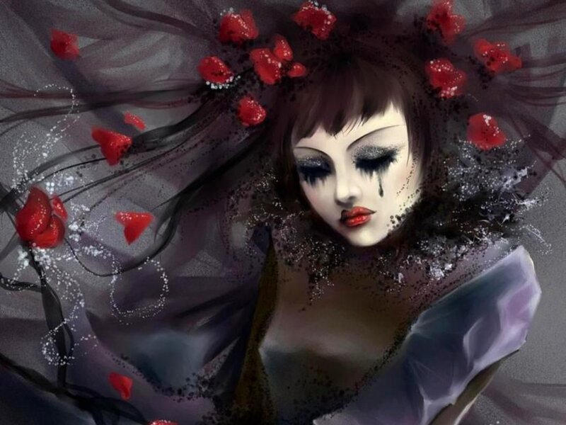 woman with red petals and dark makeup