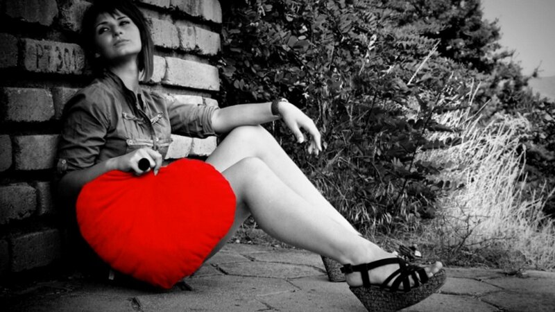 Woman with Red Pillow