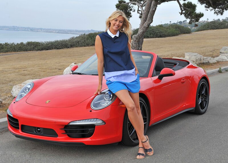 Woman with red Porsche car
