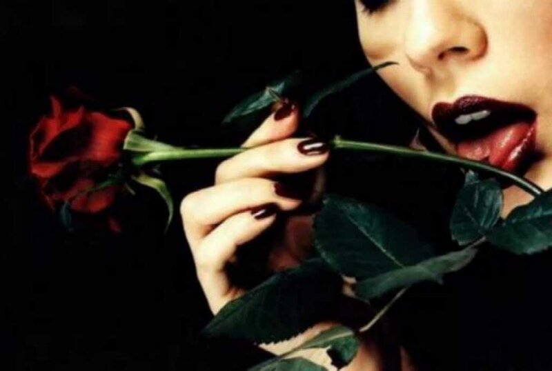 woman with red rose