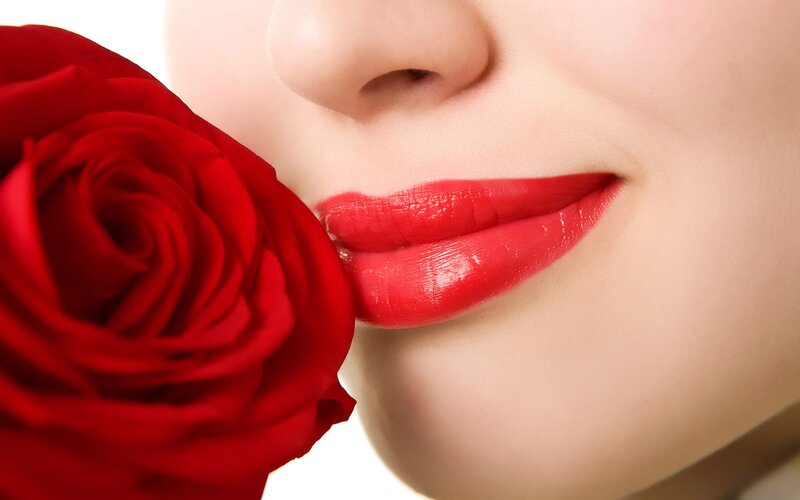 woman with red rose