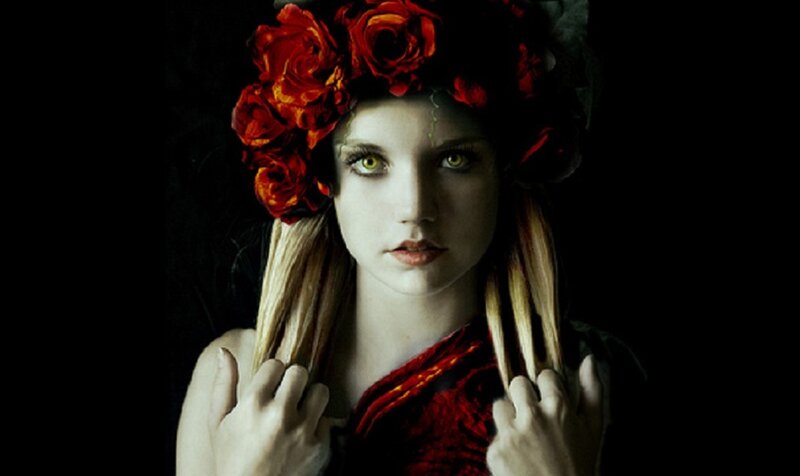 woman with red rose crown