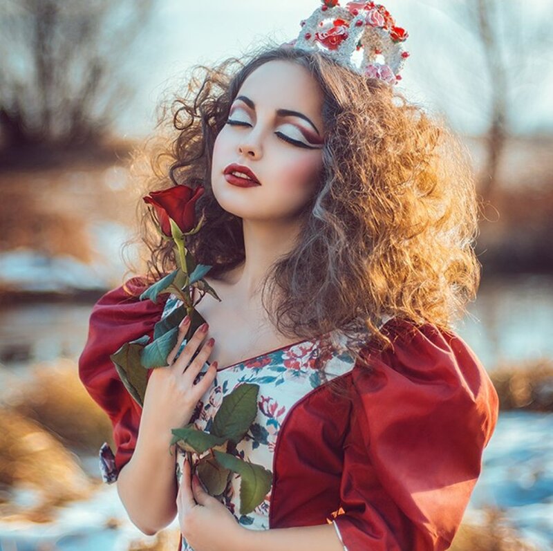 Woman with Red Rose — Dramatic, Winter