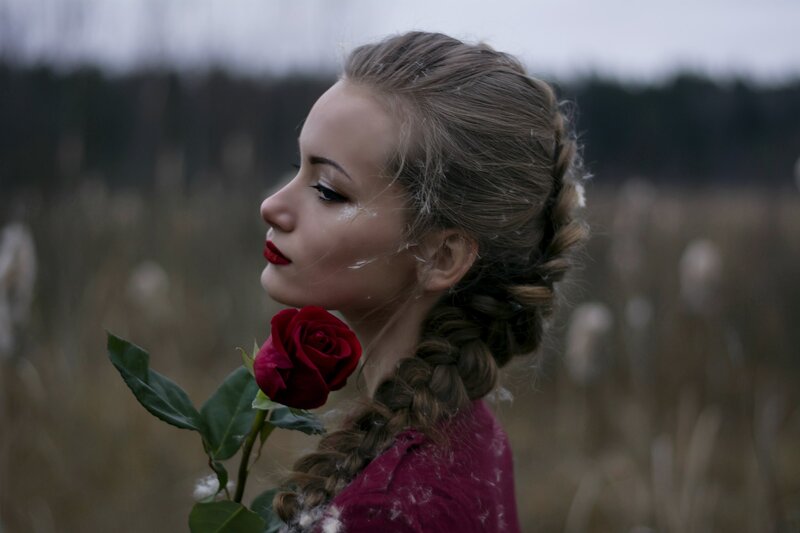 Woman with Red Rose — Melancholic