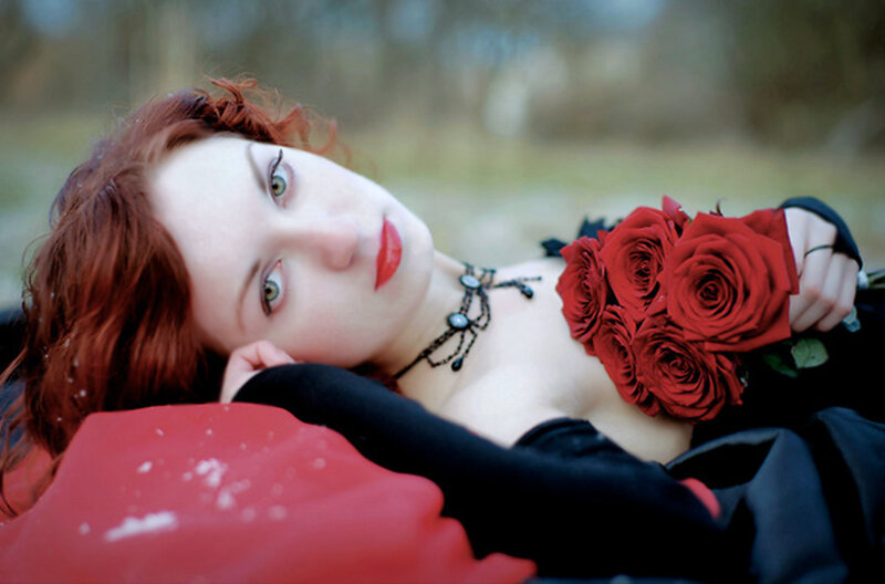 Woman with Red Roses — Dramatic, Winter