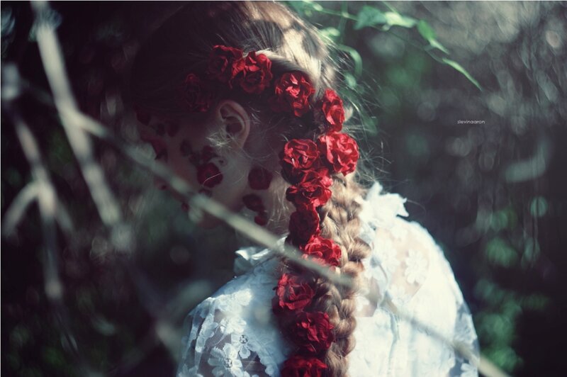 Woman with Red Roses in Hair — Dreamy