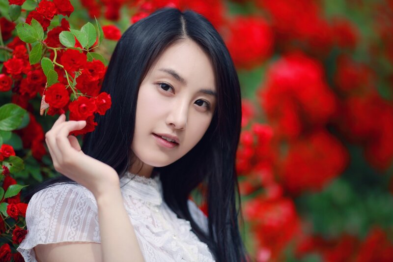 Woman with Red Roses — Serene, Summer