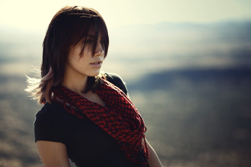 woman with red scarf outdoors