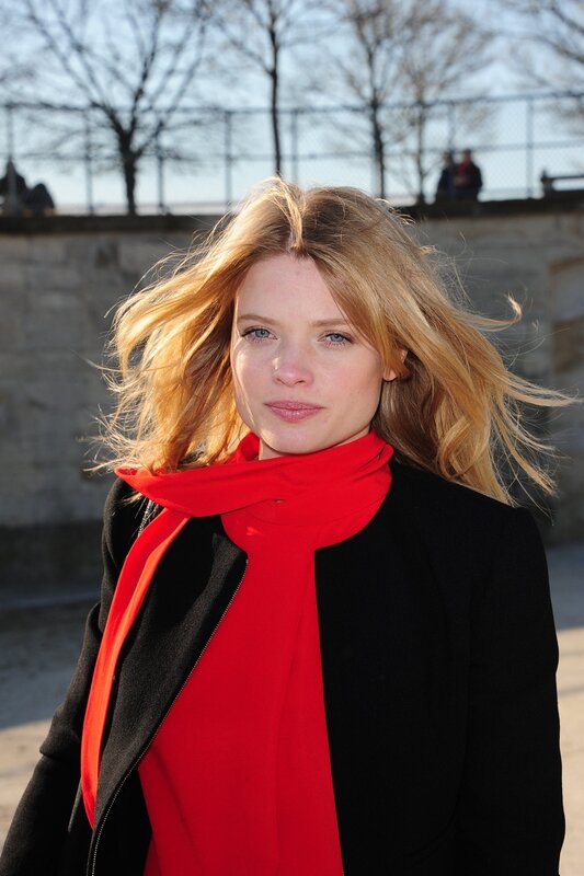 woman with red scarf outdoors
