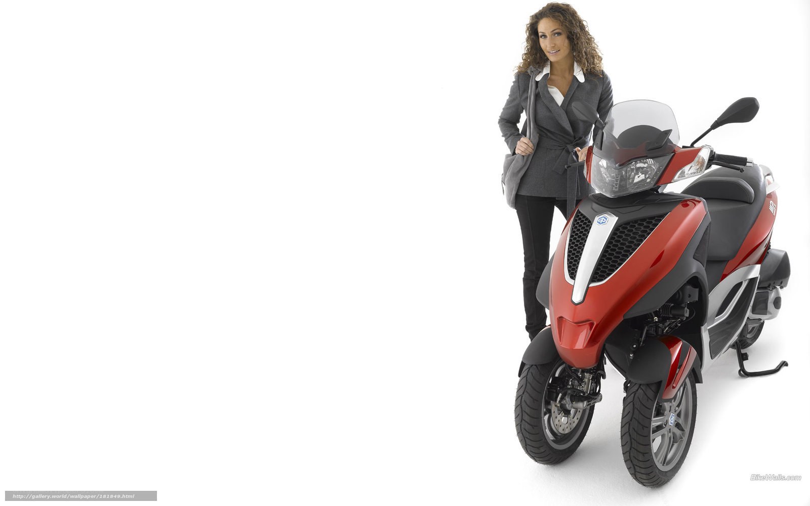 woman with red scooter