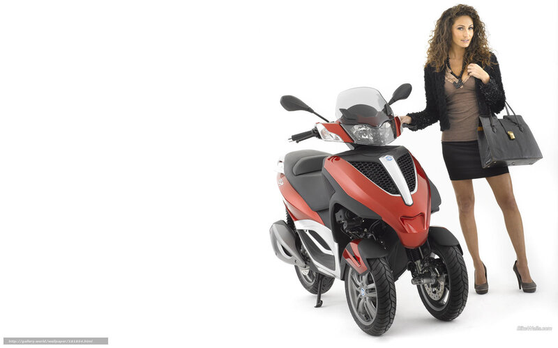 woman with red scooter