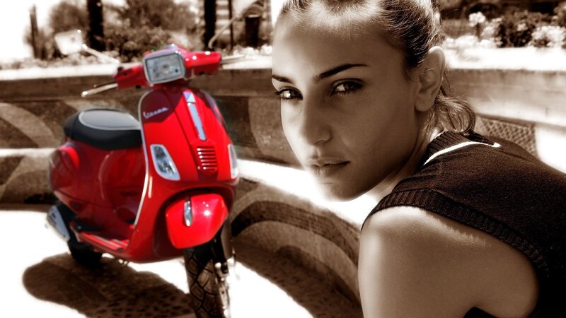 woman with red scooter