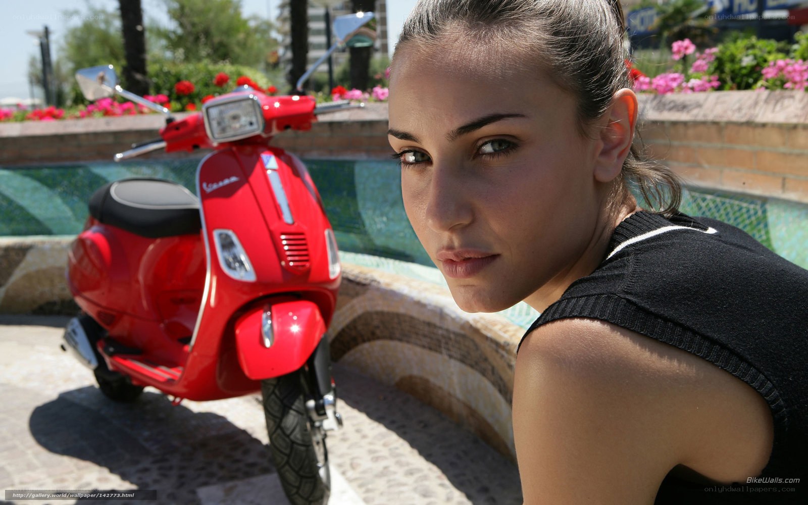 Woman with red scooter