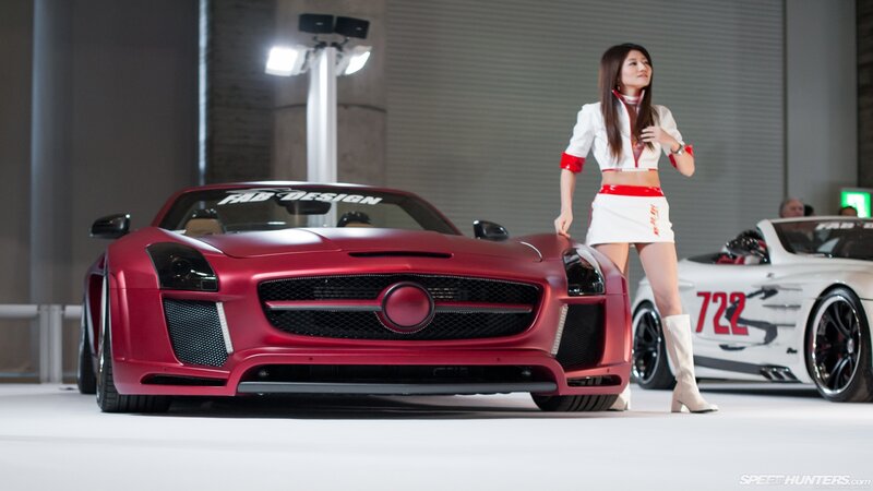Woman with Red Sports Car — Dramatic, Photograph