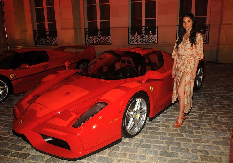 Woman with Red Sports Car — Dramatic