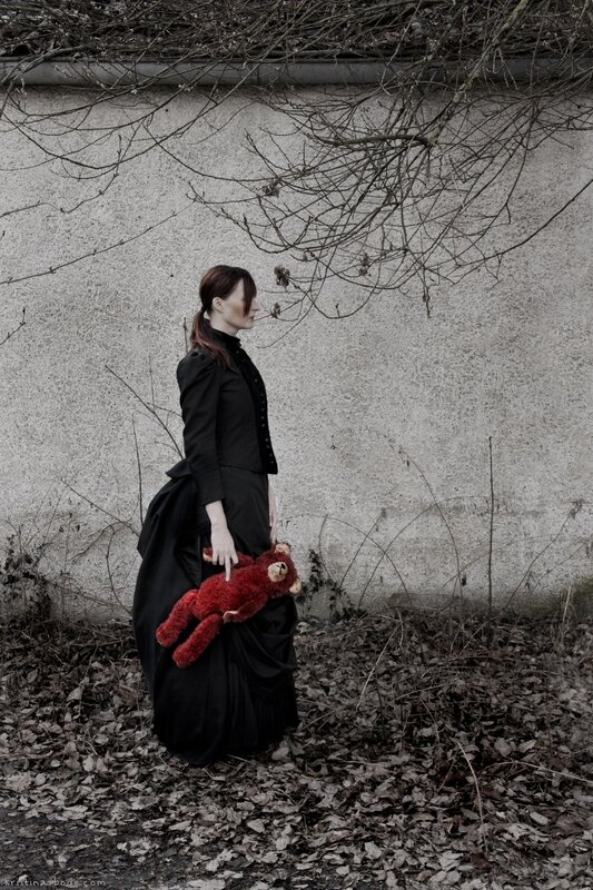 Woman with red teddy bear