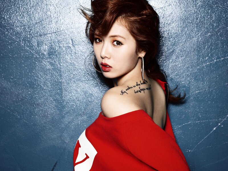 woman with red top and tattoo