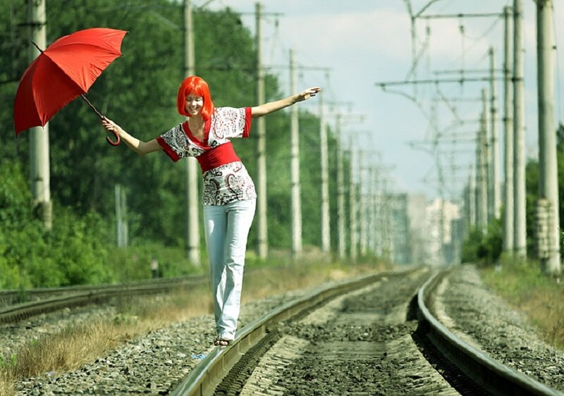 Woman with Red Umbrella — Playful
