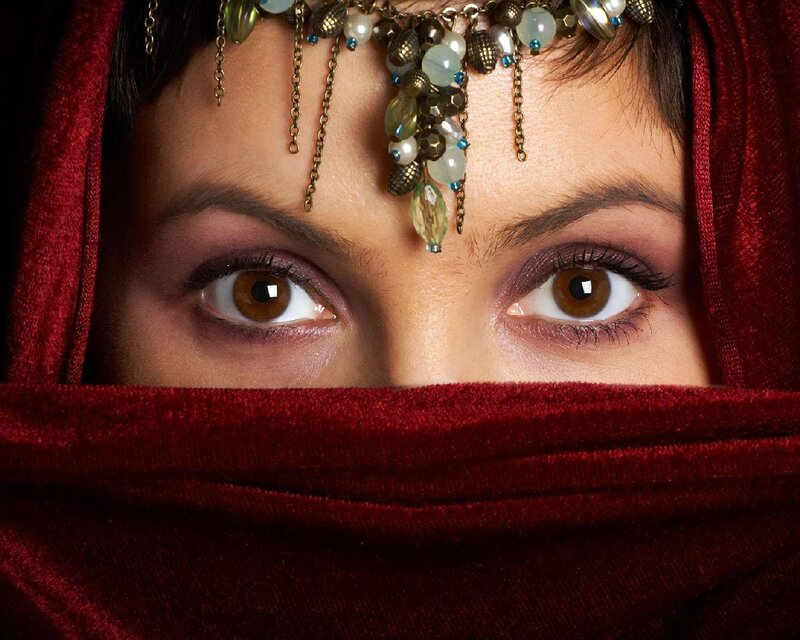 woman with red veil and headpiece