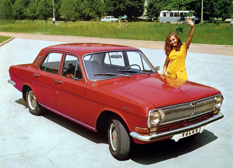 Woman with red Volga car