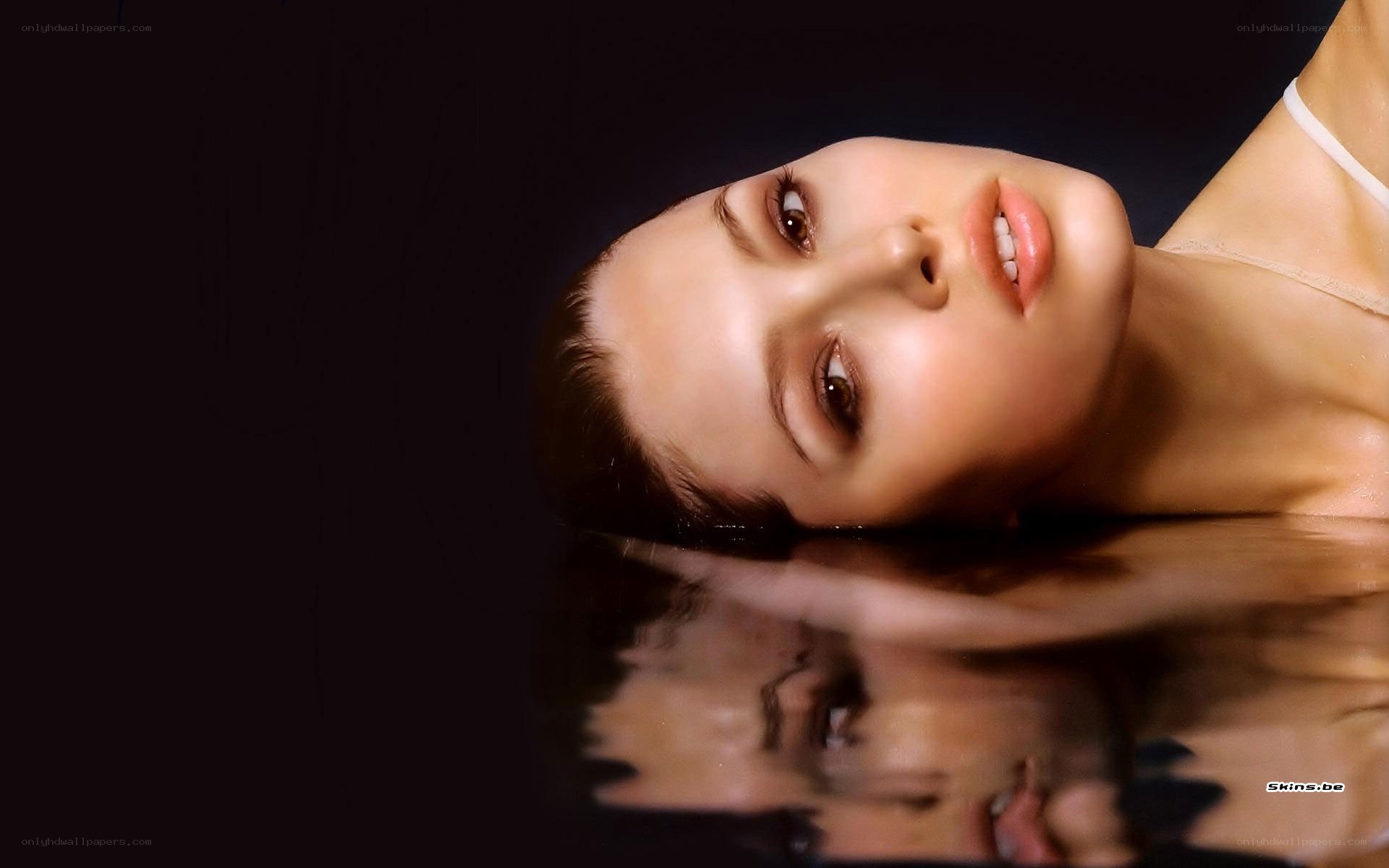 woman with reflection in water