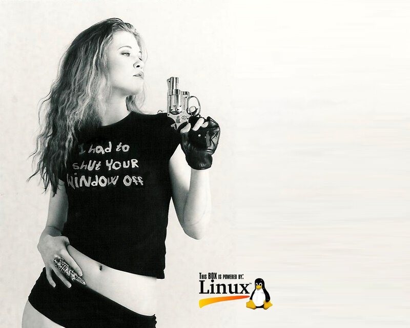Woman with revolver and Linux logo