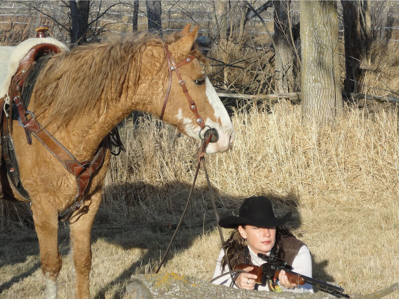 Woman with Rifle and Horse