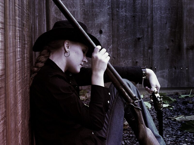 Woman with Rifle — Black, Dramatic