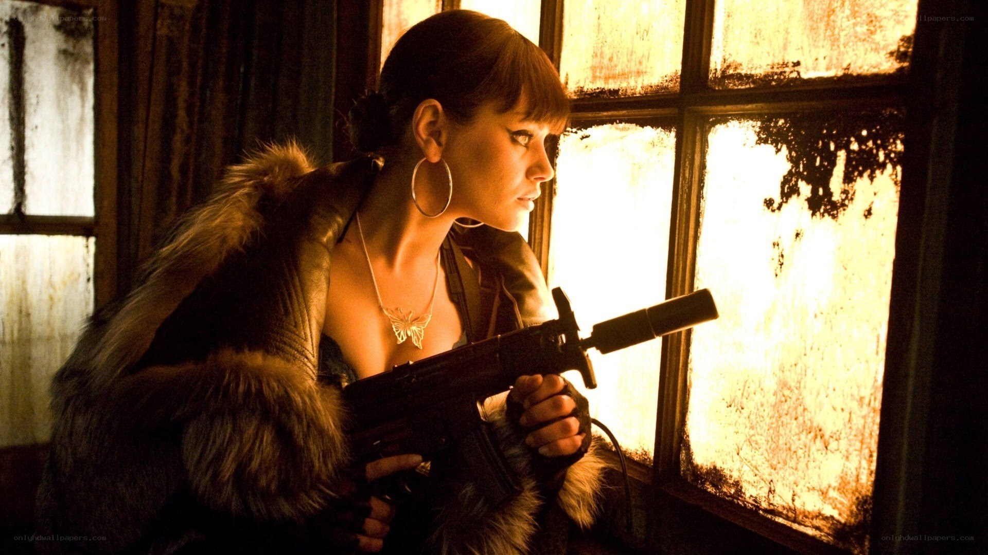 Woman with rifle by window