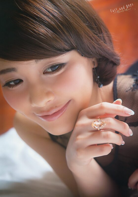 woman with ring and soft smile