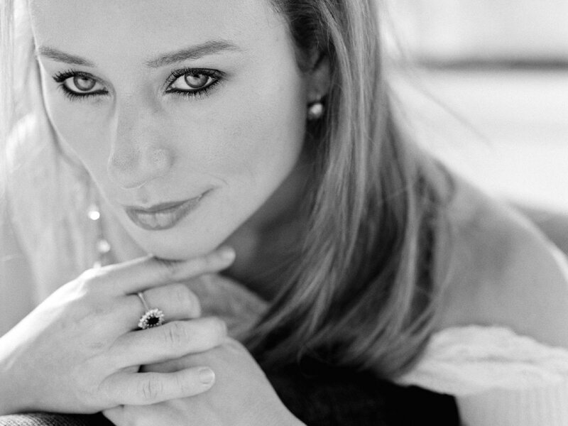 woman with ring in black and white