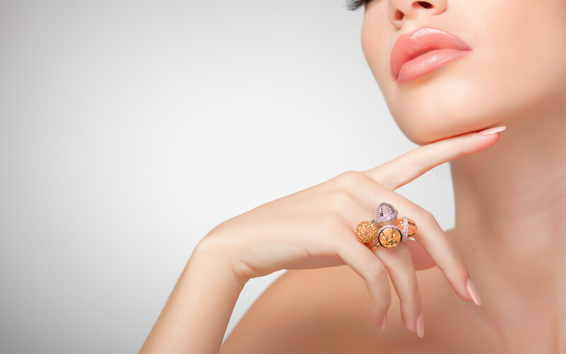 Woman with Rings on Hand — White