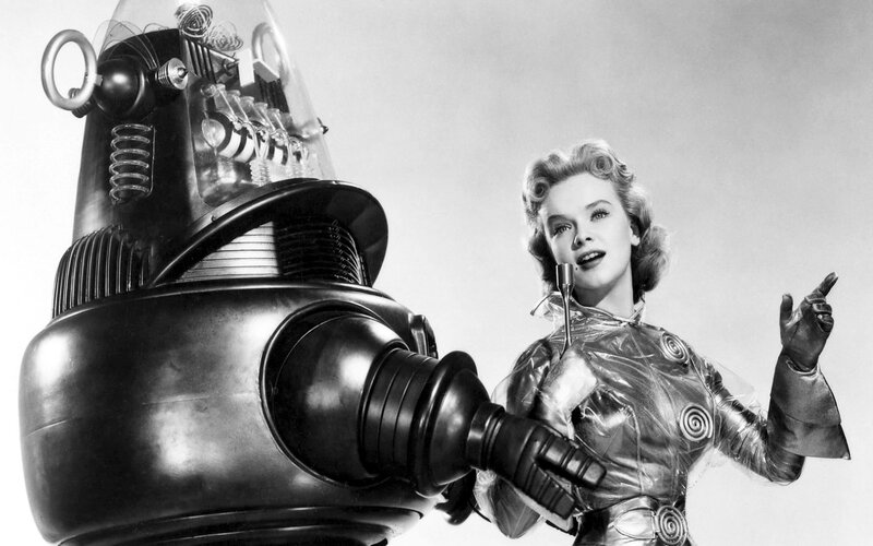 Woman with robot in sci-fi scene