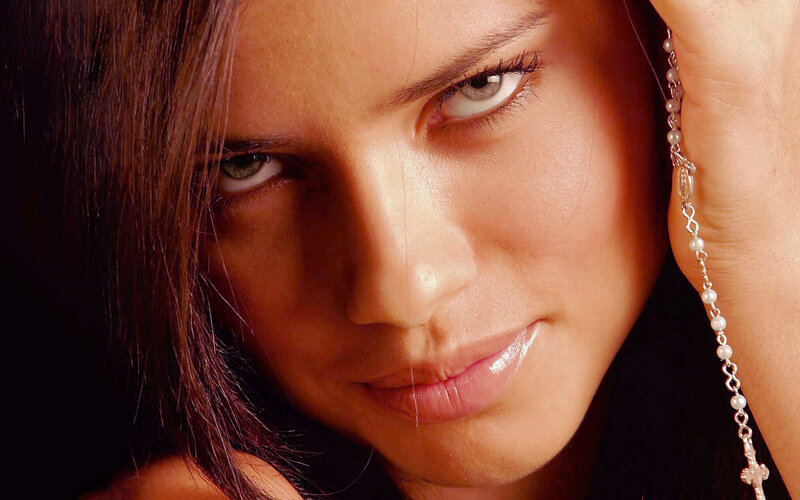 woman with rosary beads