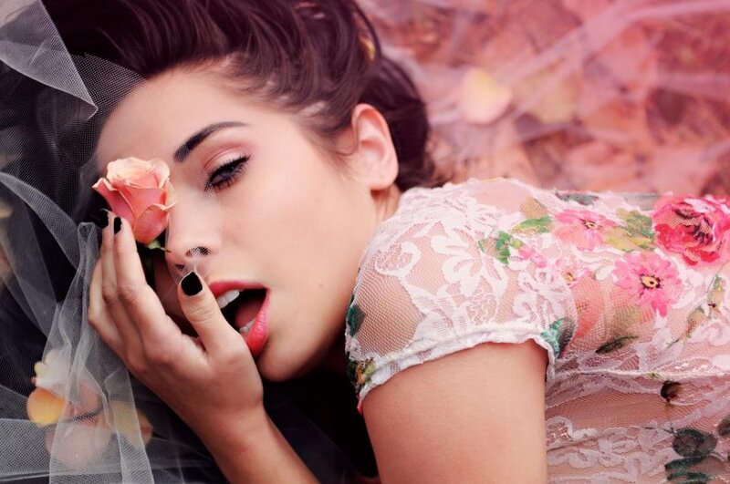 woman with rose and veil