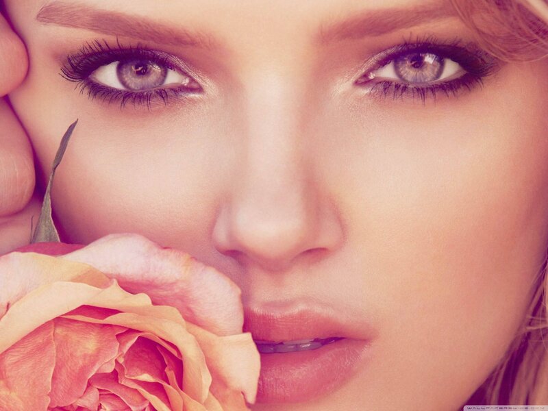 woman with rose close-up
