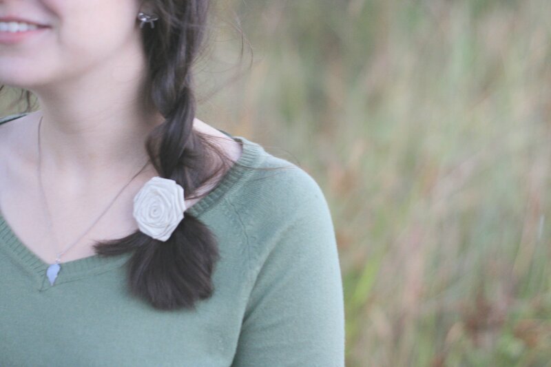 woman with rose hair accessory