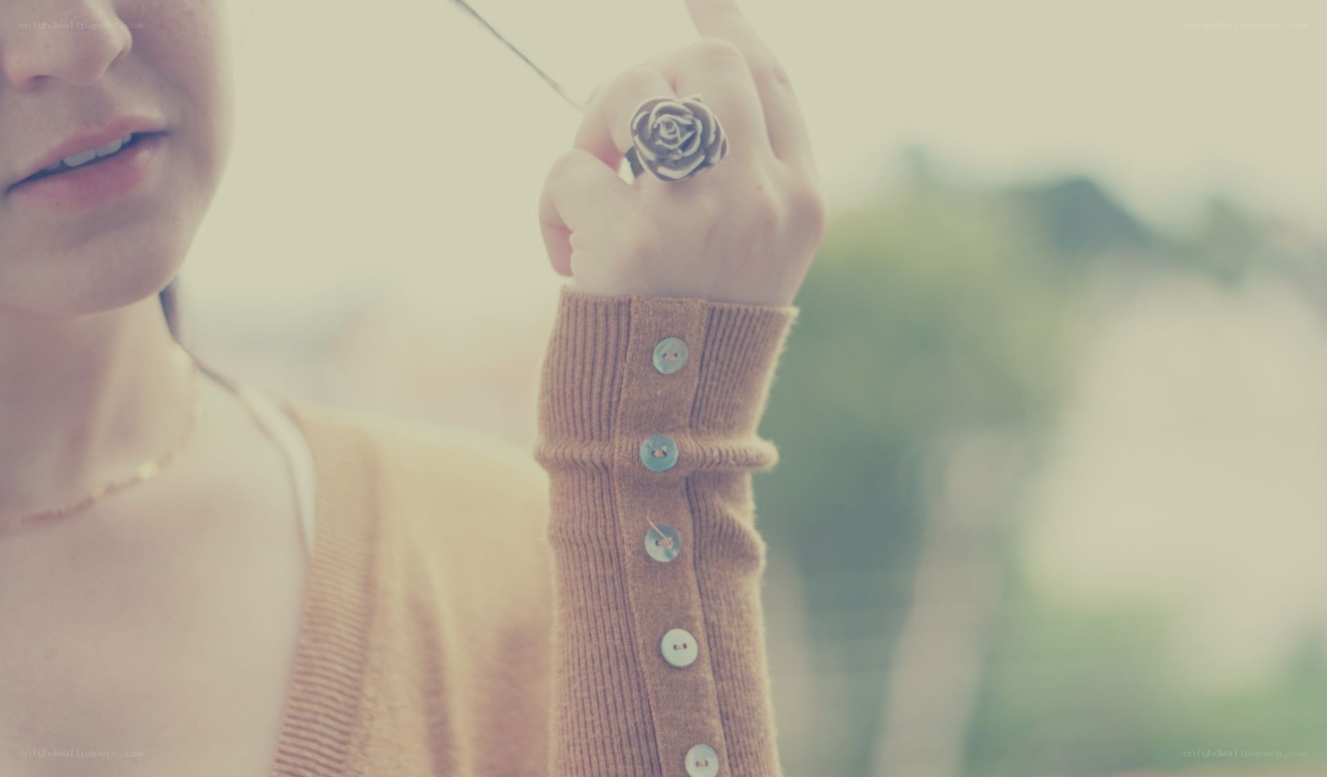 woman with rose ring