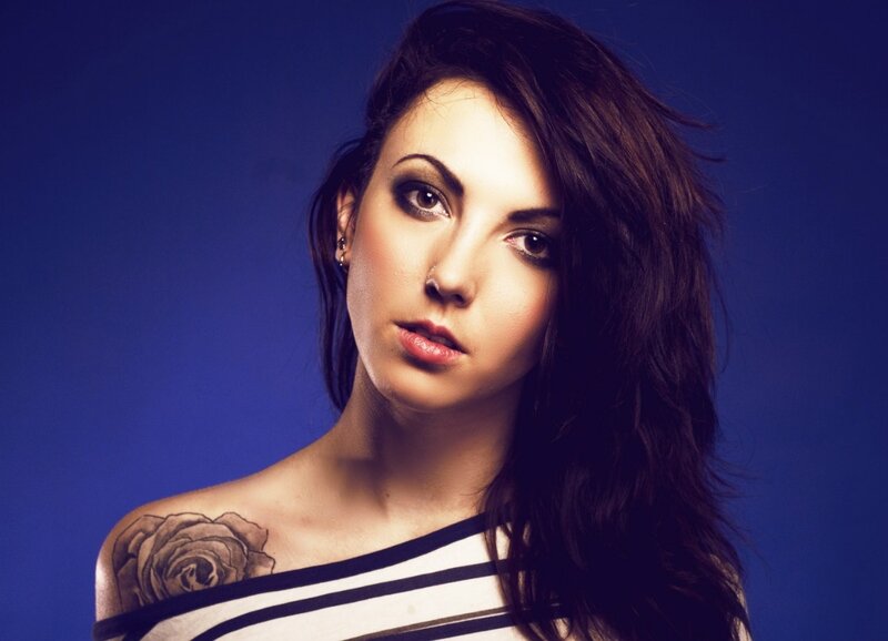 woman with rose tattoo