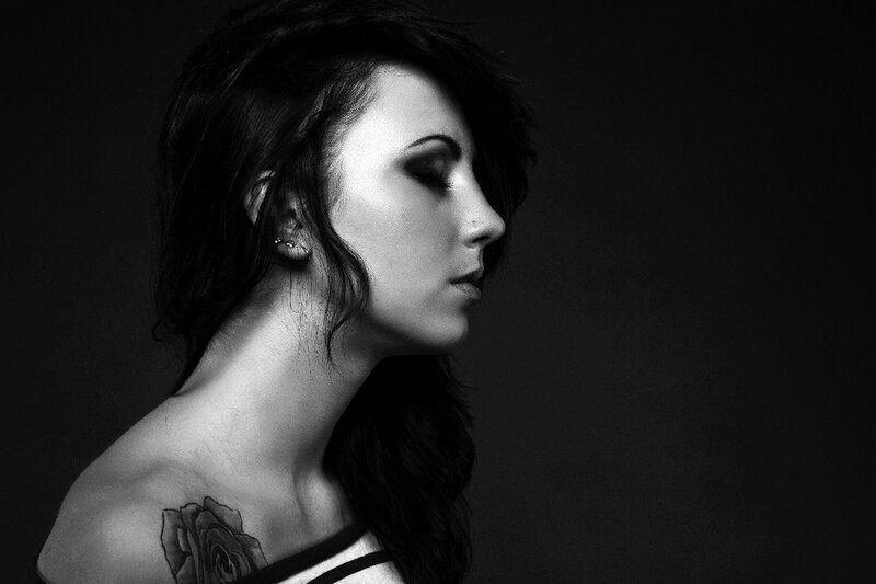 woman with rose tattoo